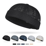 Close-up detail of mesh weave on brimless docker cap