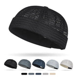 Close-up detail of mesh weave on brimless docker cap