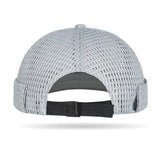 Model wearing mesh brimless docker cap — side on-head view