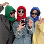 Multicolor Balaclava hoods worn by three models showing ribbed knit texture and fit on face