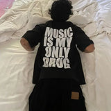 Music Is My Only Drug oversized graphic tee, front view