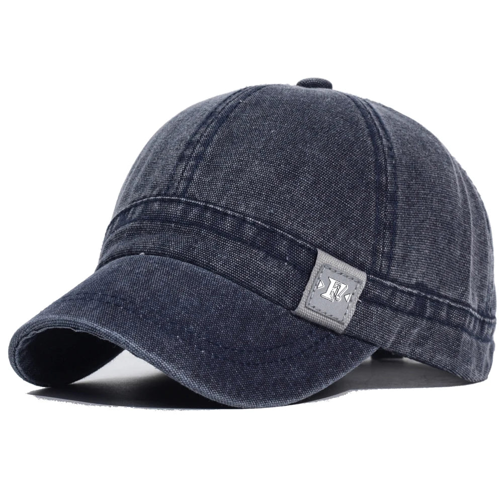 Navy Blue Acid wash short brim baseball cap — adjustable strap detail