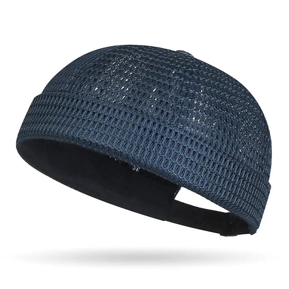 Navy Blue Model wearing mesh brimless docker cap — angled on-head view
