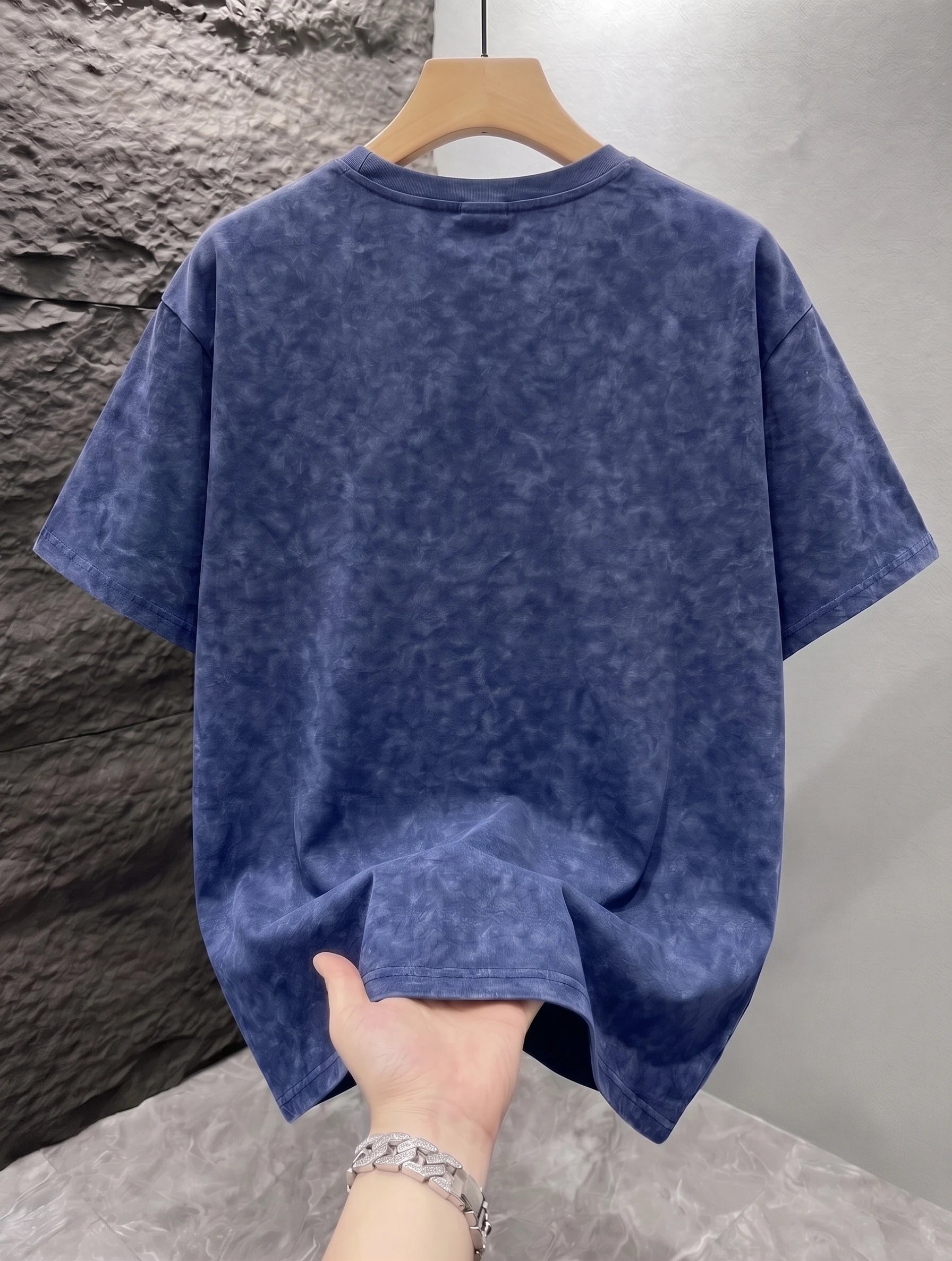 Navy Blue Mineral washed oversized graphic tee worn, side view