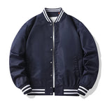 Navy blue bomber jacket with white accents on a white background
