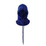 Blue knitted balaclava on a light gray background