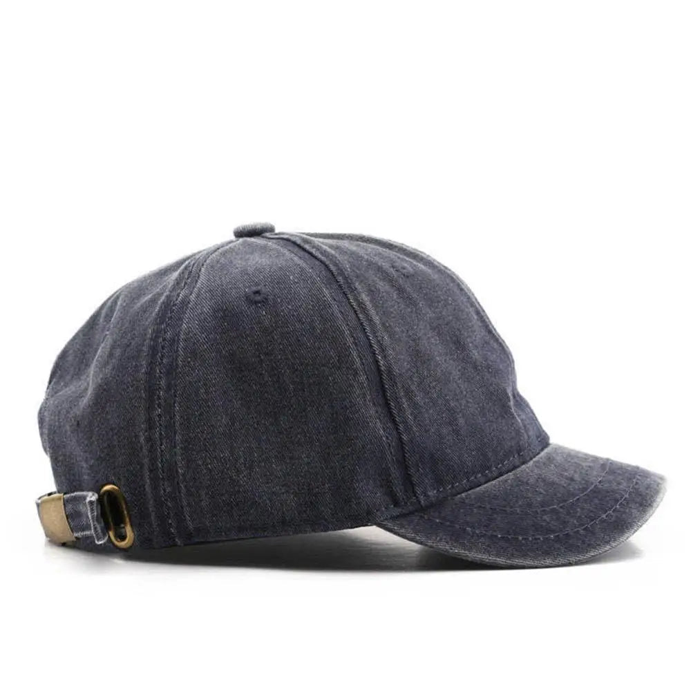 Navy blue baseball cap on a white background with 'navy' text.