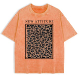 Orange leopard print oversized vintage tee — styled outfit shot