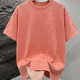 Orange Mineral washed oversized graphic tee, lifestyle shot 2