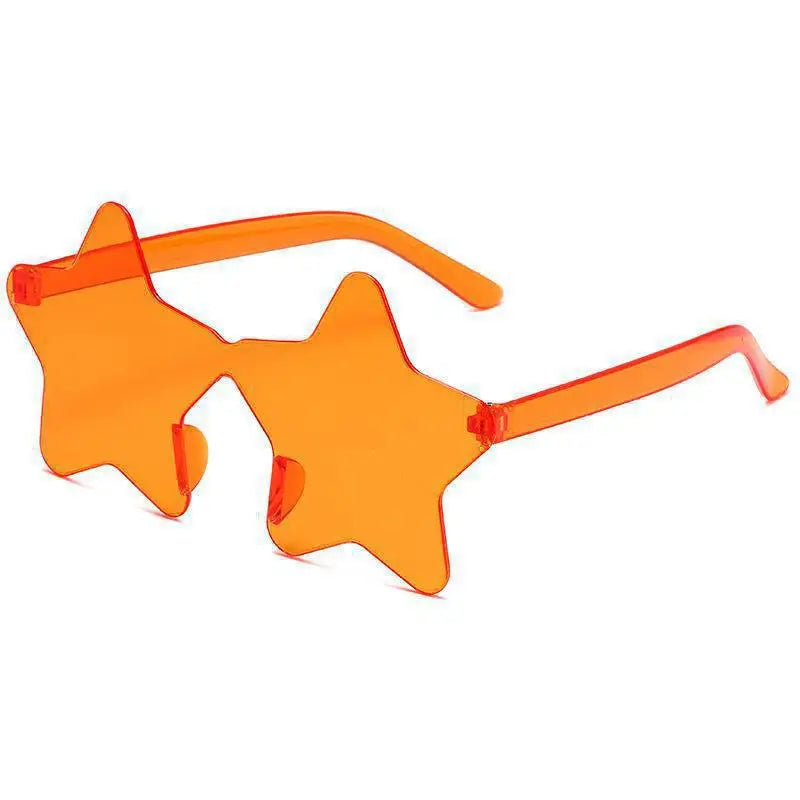 Orange Star-shaped transparent jelly sunglasses on model, close-up