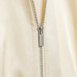 Oversized satin varsity bomber jacket, side view