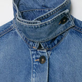 Women's oversized vintage wash denim-effect jacket — side profile showing dropped shoulders and loose fit