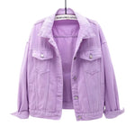 Women's oversized blue denim jacket, side profile showing relaxed fit and length