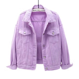 Women's oversized blue denim jacket, side profile showing relaxed fit and length