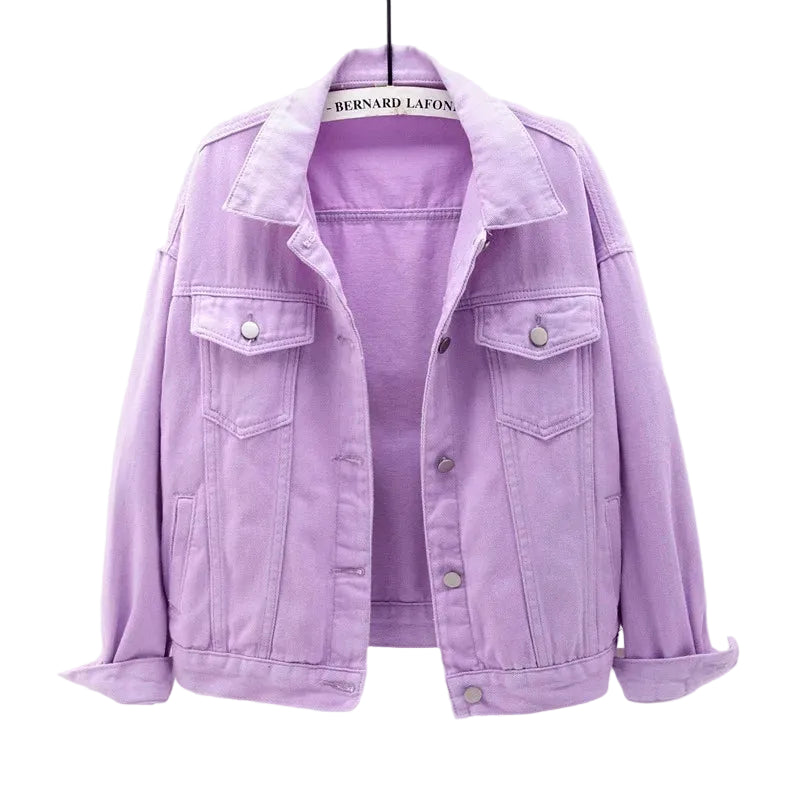 Women's oversized blue denim jacket, side profile showing relaxed fit and length