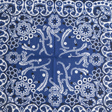 Paisley bandana worn as a neck scarf