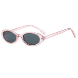 Pink-Black Close-up detail of gradient photochromic lens on small oval cat eye sunglasses