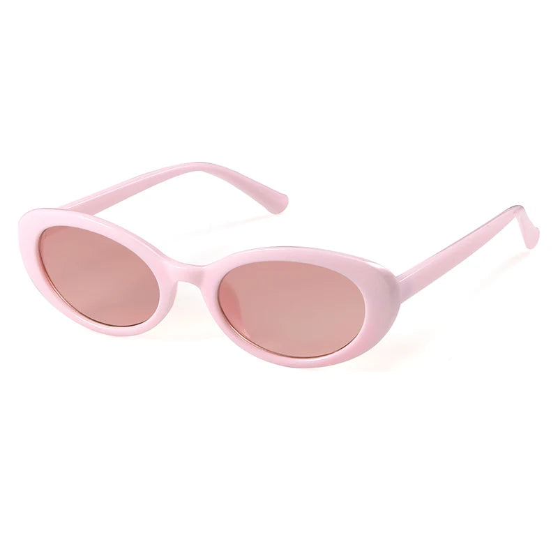 Pink Oval sunglasses flat lay