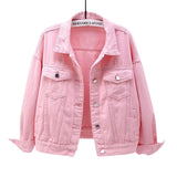 Pink Model wearing women's oversized blue denim jacket, full-length on-figure view