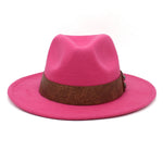Pink Panama fedora hat front view with pinched crown and embossed leather trim band
