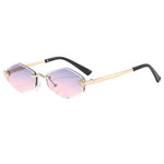 Sunglasses with gold frame and pink gradient lenses on a white background
