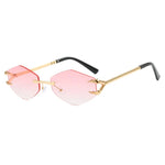 Sunglasses with pink lenses and gold frames on a white background