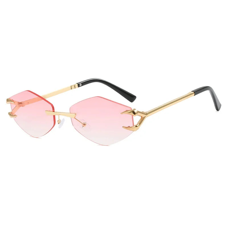 Sunglasses with pink lenses and gold frames on a white background