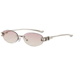 Pink Yellow Rimless oval gradient sunglasses — flat lay