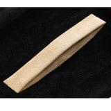 Beige rectangular tile on a black background