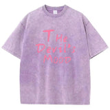 Purple Devil's Mood washed oversized graphic tee — styled streetwear look