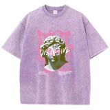 Purple Women's drop-shoulder graphic tee in street style outfit