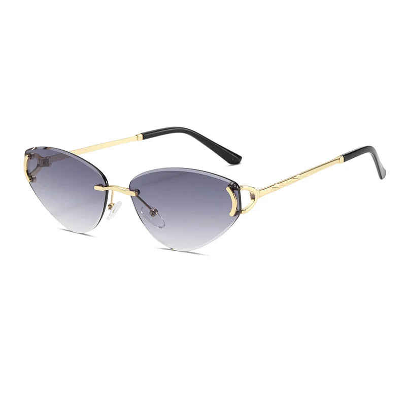 Sunglasses with gold frame and gradient lenses on a white background