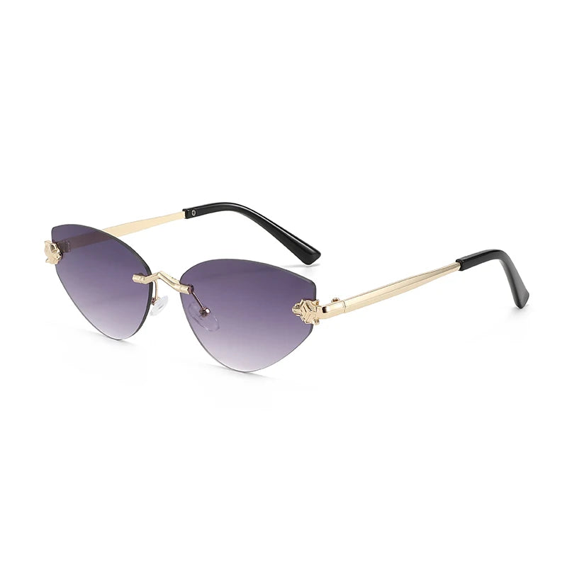 Sunglasses with gold frame and purple arms on a white background