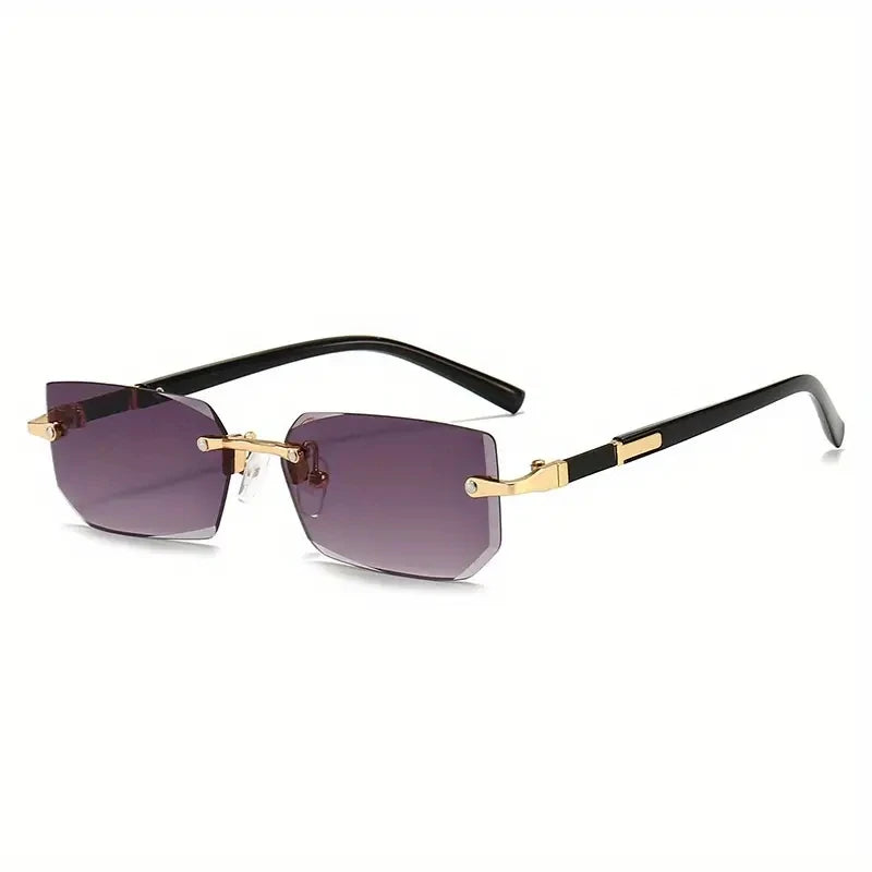 Sunglasses with gold frames and purple lenses on a white background