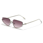 Sunglasses with pink lenses and silver frame on a white background