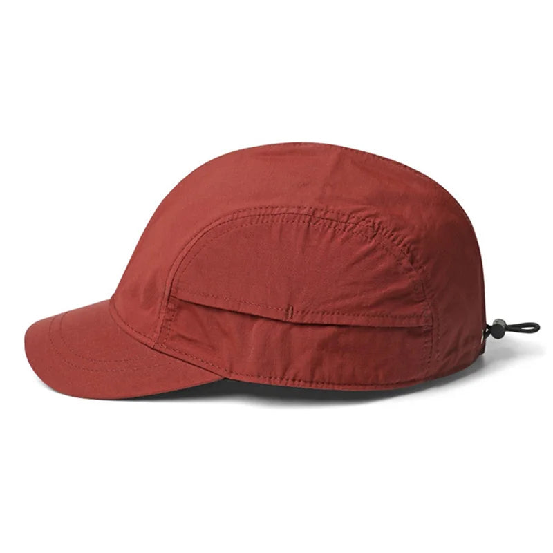 Red cap with a strap on a white background