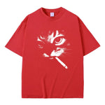 red Model wearing smoking cat graphic tee — on-body side view
