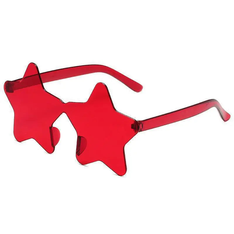 Red Star-shaped transparent jelly sunglasses worn, three-quarter view
