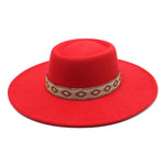 Red wide-brim felt fedora hat worn at an angle