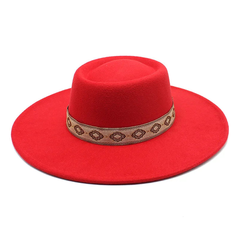 Red wide-brim felt fedora hat worn at an angle