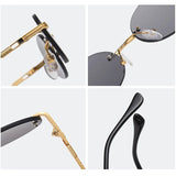 Rimless oval sunglasses on model, side view