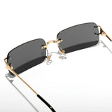Rimless rectangle sunglasses on model, side