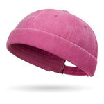 Pink baseball cap on a white background