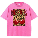 Rose Red-Xy379 Distressed cherry leopard knit tee on model, waist-up view