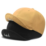 Short brim baseball cap, solid colorway, side profile view