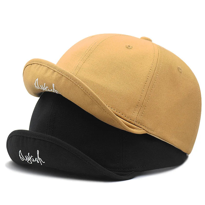 Short brim baseball cap, solid colorway, side profile view