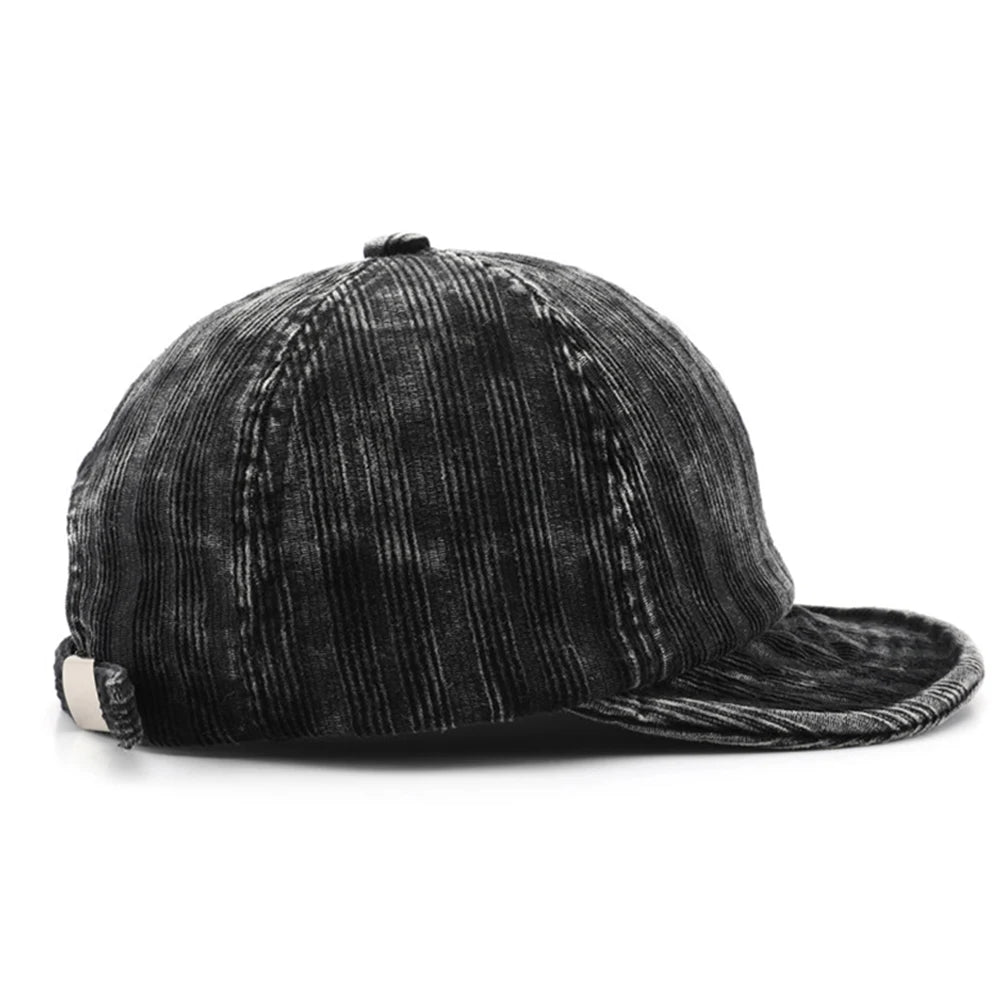 Short brim corduroy baseball cap, back view showing adjustable strap