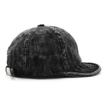 Short brim corduroy baseball cap, back view showing adjustable strap