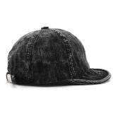 Short brim corduroy baseball cap, back view showing adjustable strap