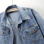 Women's short sleeve cropped denim jacket, collar and button detail